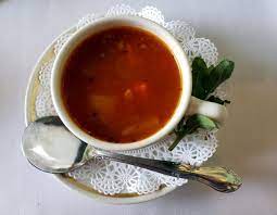 image of soup in a cup on table